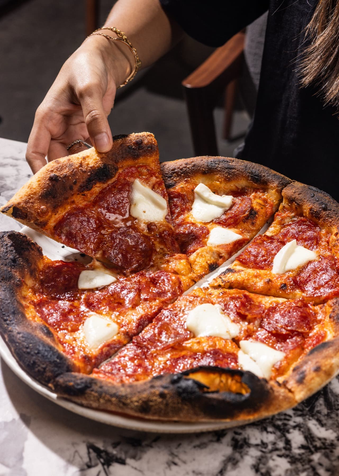 Wood-fired pepperoni pizza